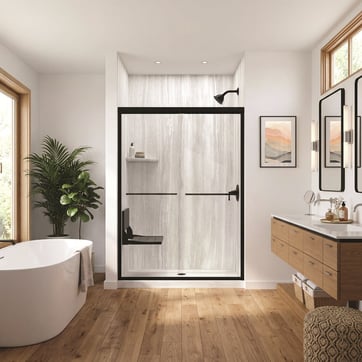 Shower with black fixtures and fold down seat