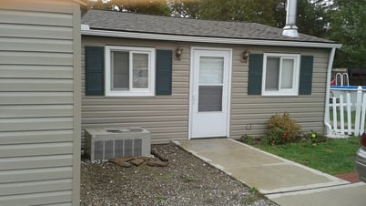 After Back of House New Vinyl Siding