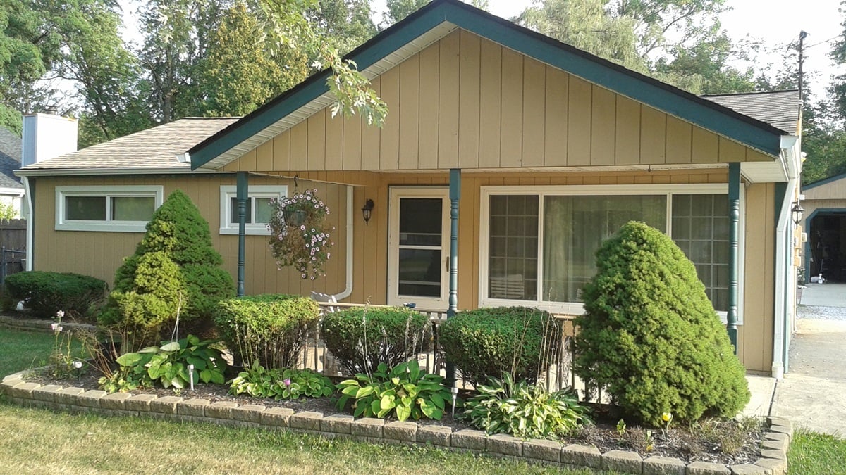 Before Front of House with Wood