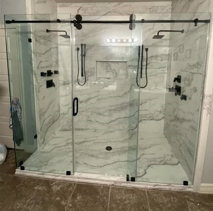 Triple Glass Door Walk In Shower in SignatureStone