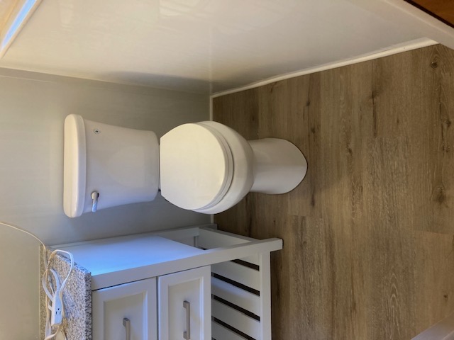 Oak flooring with new toilet