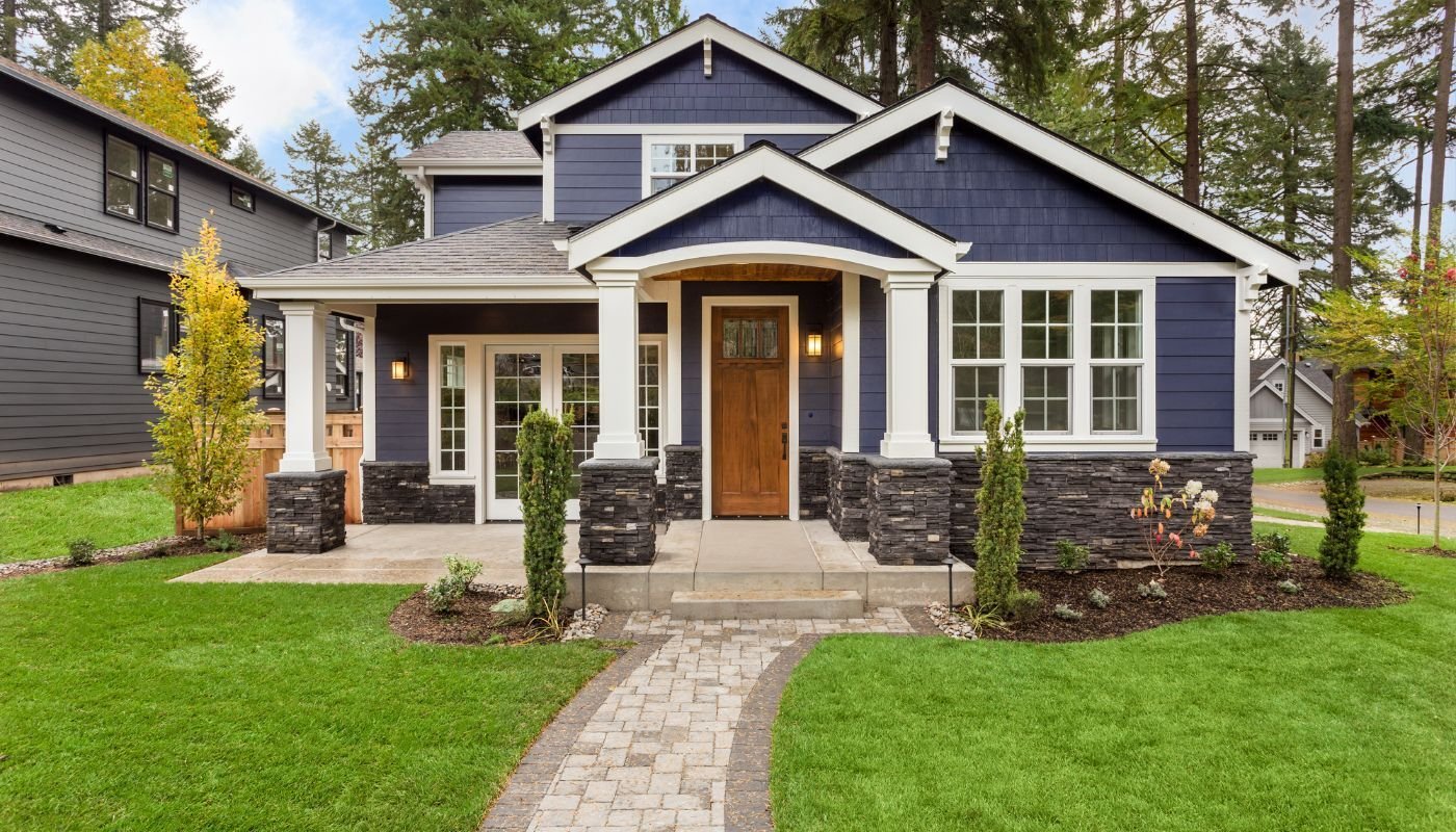 Blue house with white windows and grids
